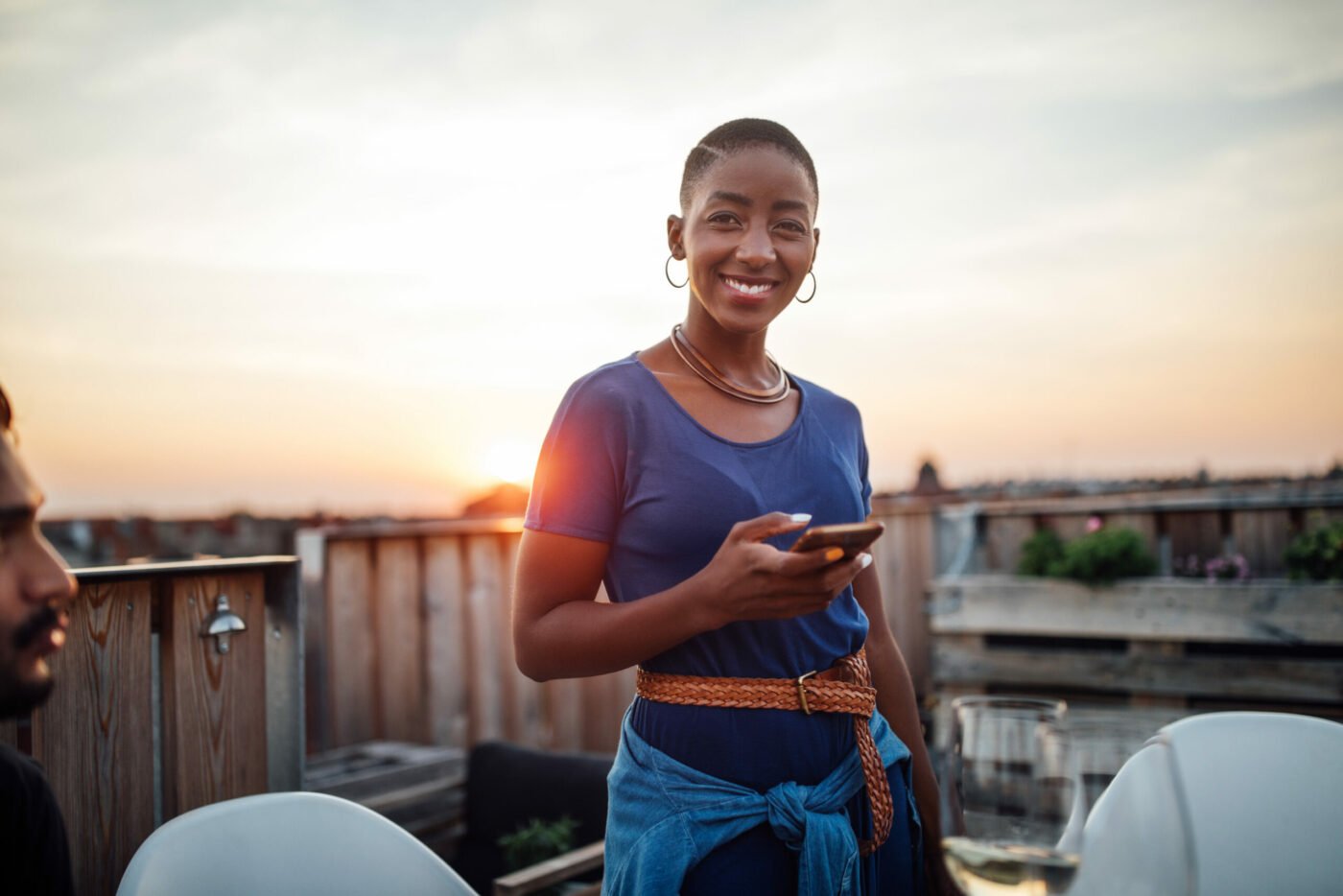 Smiling woman on her phone
